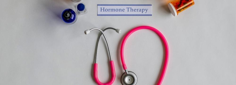 stethoscope, and hormones surrounding text that reads "hormone therapy"