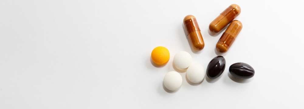 Fiber supplements and other nutritional supplements piled on table